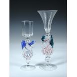 William Gudenrath (Born 1954), two 'dragon' glasses, the taller with spiral reeded bowl and foot,