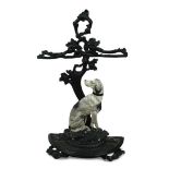 A mid 19th century cast iron stick stand, of a seated hound, inscribed 'Cave Canem' 74 x 44cm (29