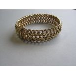 A chain mesh cuff bracelet, designed as three rows of curb links in a slightly convex cross section,