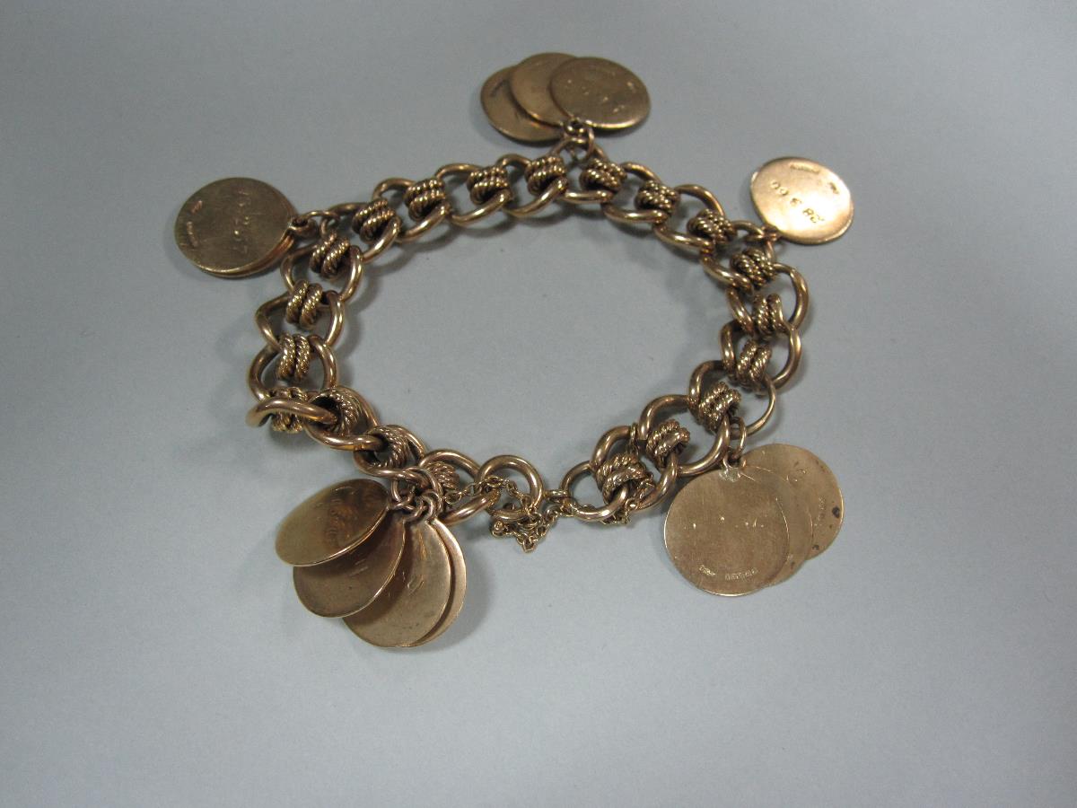 A 9ct gold fancy link bracelet suspending fourteen name discs, each 1.6cm disc engraved with a - Image 3 of 3