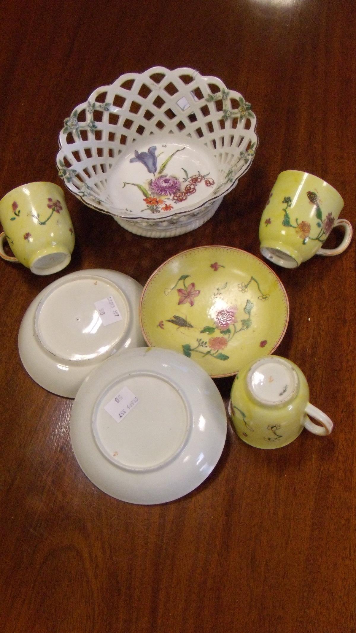 A Chelsea red anchor basket together with three cups and saucers, the centre of the basket painted