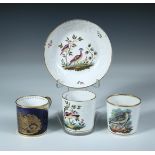 A Spode coffee can and saucer and two other Spode cans, the first painted with pattern number 2099