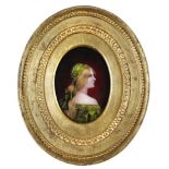 A Limoges enamel portrait by Pierre Bonnaud, circa 1890, finely painted with a long-haired maiden in