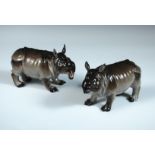 A pair of 19th century Meissen Rhinoceros modelled after Kandler or Kirchner, both of the brown
