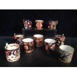 Ten early 19th century Imari palette coffee cans, including examples by Derby, Spode, Worcester