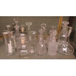 A quantity of cut glass decanters and various other glassware