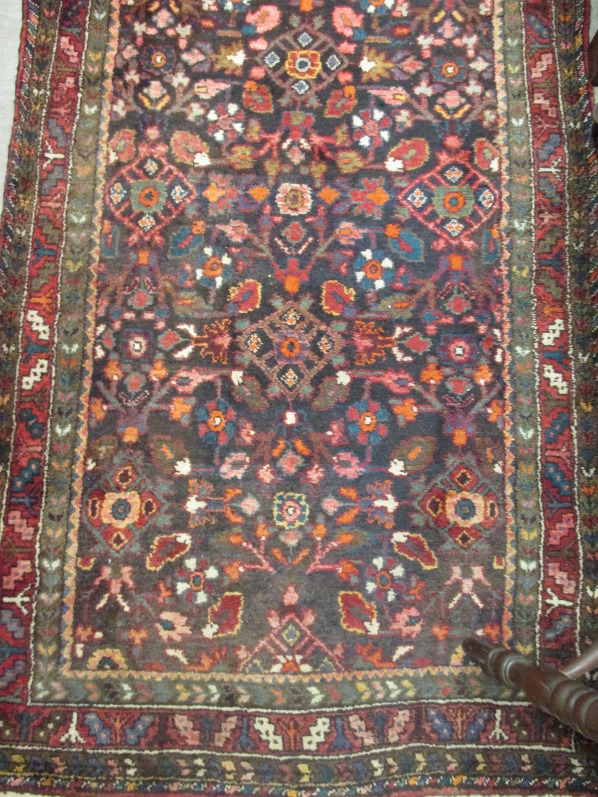 A Persian blue ground runner with multiple borders, 332 x 116cm
