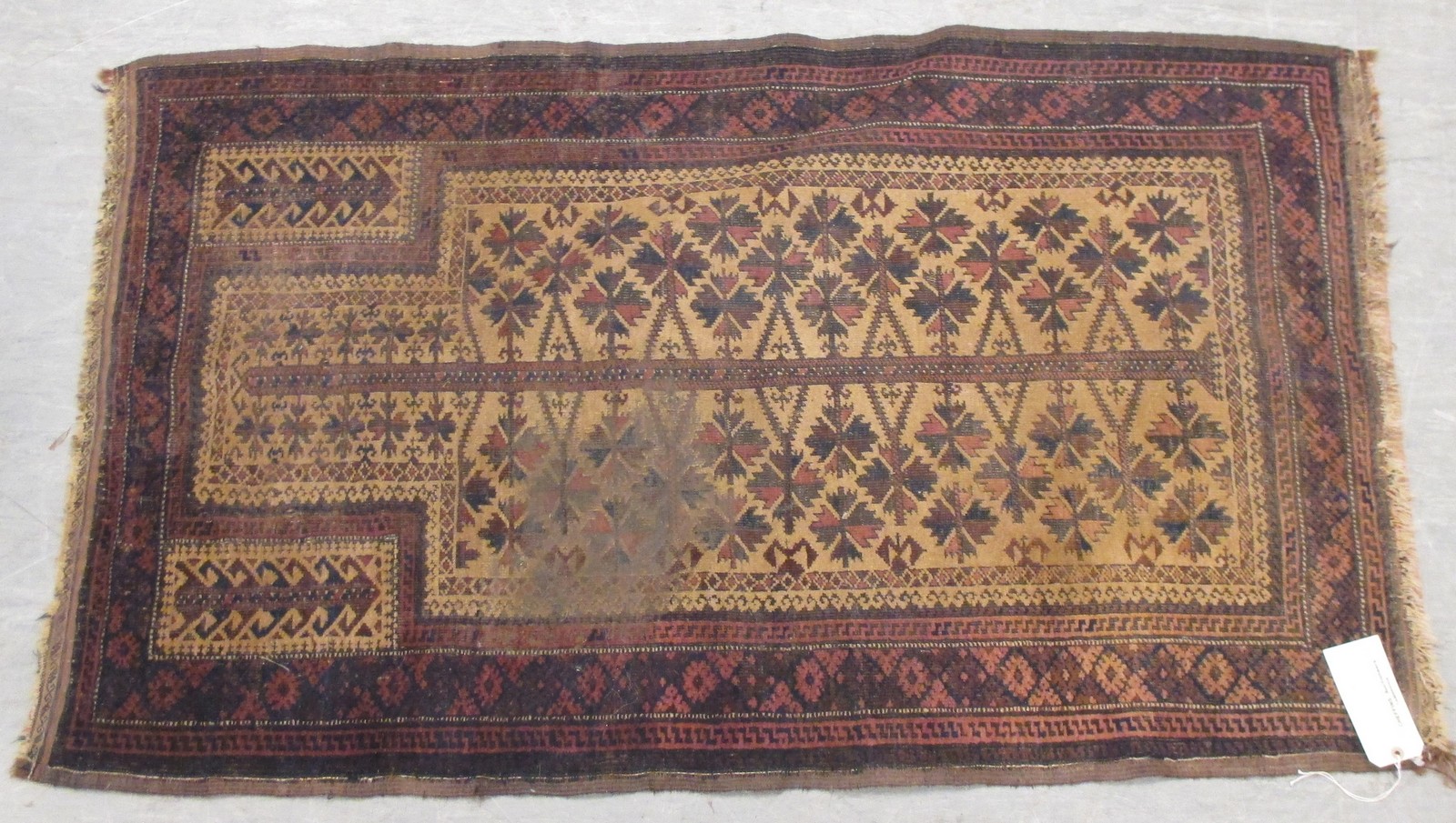A Tekke rug on a red ground, 184 x 128cm together with two others, 140 x 96cm, 140 x 82cm (3) - Bild 3 aus 3