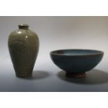 A junyao bowl, 17cm diameter and a celadon vase, 16cm high
