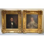 English School (19th Century) - A pair of portraits of a lady and Gentleman, seated, half length,