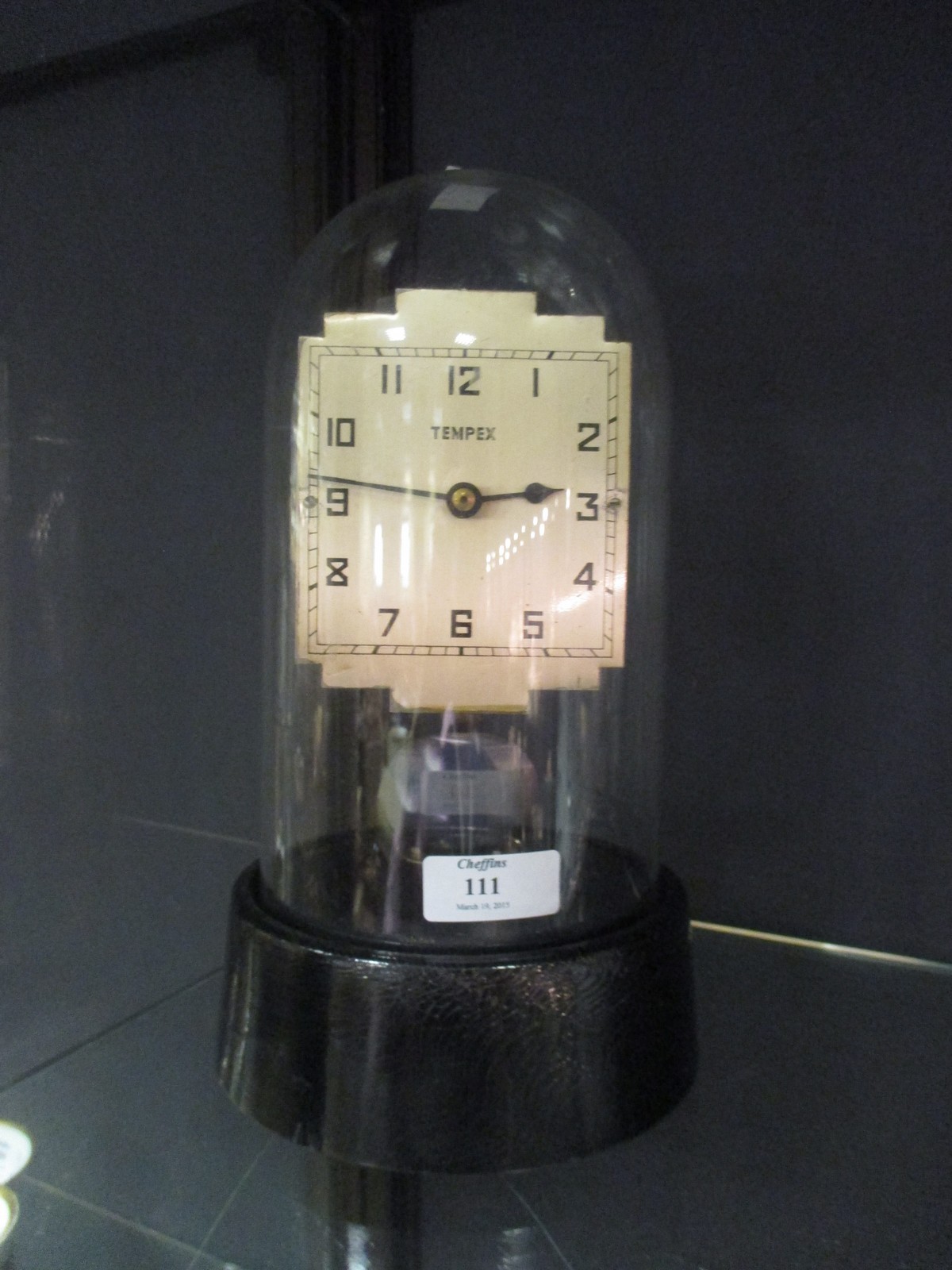 A Tempex electric timepiece under dome