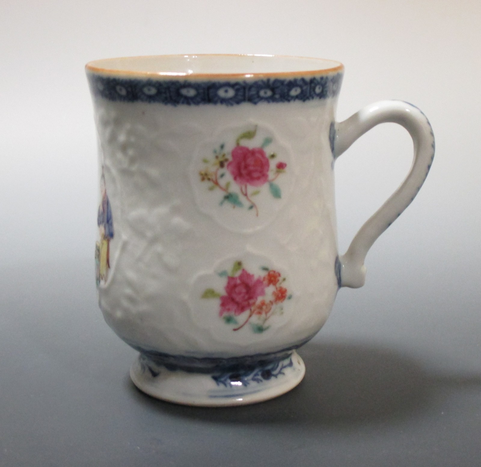 A Chinese design porcelain baluster mug with enamel decoration