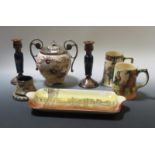 A pair of Doulton stoneware candlesticks, a match striker and various Royal Doulton pottery (7)