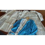 A blue silk jacket, matching pattern cream trousers, underclothes and a full length cream silk robe,