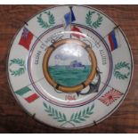 Three French pottery plates, each painted commemorating the Army, Navy and Air Force 1914-1915,