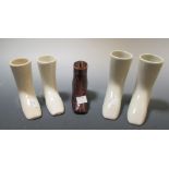 A collection of five mid 19th century pottery boots, tallest 11cm