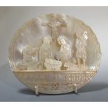 A mother of pearl nativity scene, the shell 17cm wide