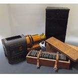 A Magic Lantern and two cases of assorted slides