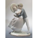 A Lladro figure of a couple dancing, 25cm tall