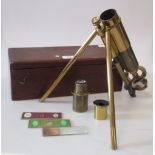 A Baker London portable microscope, the lacquered body in fitted wooden case