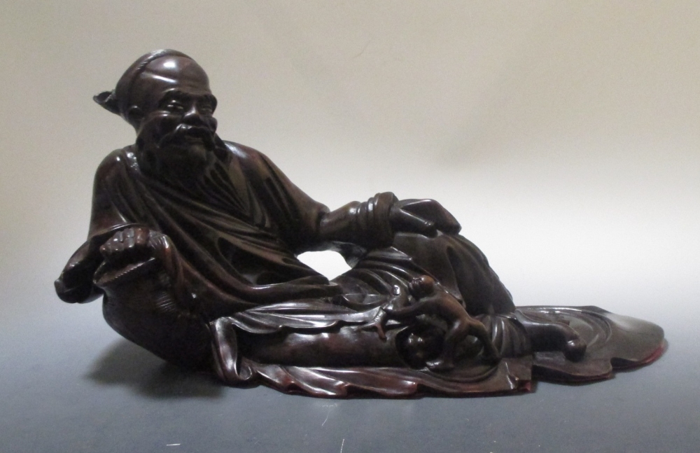 A late 18th/early 19th century lacquered wooden figure of an immortal - Image 2 of 2