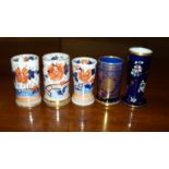 Five Mason's ironstone spill vases, three in Imari palette with gardens, the tallest 11cm high,