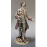 A 19th century Furstenburg figure of a gallant, 23cm tall