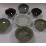 Four celadon wares, two hare fur and a Ting yao dish, the largest 3.5cm diameter