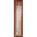 An oak Admiral Fitzroy barometer, late 19th century, the arched case with glazed front displaying