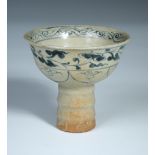 A Yuan dynasty blue and white stem cup, 9cm tall  Some brown staining otherwise good