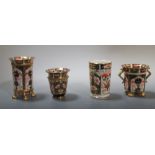 Three Crown Derby Imari palette spill vases, 1912, 1913 and 1911, together with a Stevenson and