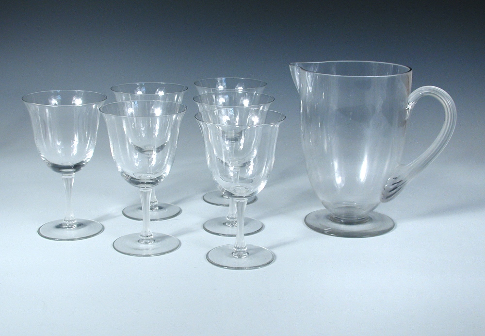 A Lalique Barsac pattern jug and six glasses, the jug with fluted handle, the glasses with similar