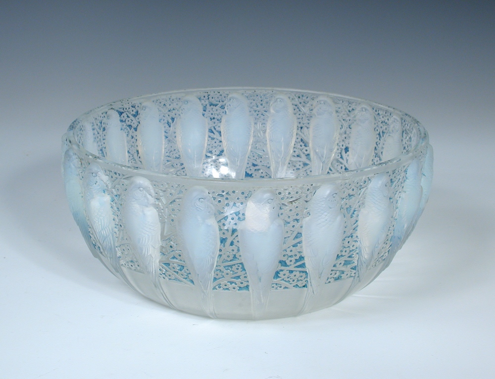 René Lalique, a Perruches pattern opalescent and blue stained glass bowl, designed in 1931,