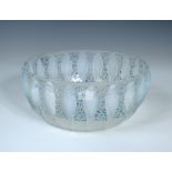 René Lalique, a Perruches pattern opalescent and blue stained glass bowl, designed in 1931,