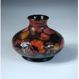 A Moorcroft anemone pattern flambé vase, of squat baluster form, painted and impressed marks along