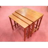 France and Son, a nest of three Danish teak occasional tables, labels to underside, the largest 53 x