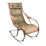 An early 20th century bent steel rocking chair in the manner of R. W. Winfield, with tan leather