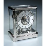 A Le Coultre Atmos clock, later Rhodium plated, the fifteen jewel 519 calibre single train