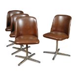 A set of four mid 20th century vinyl upholstered swivel dining chairs, upholstered in brown on