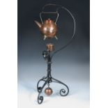 Attributed to Dr. Christopher Dresser, a Benham and Froud copper and brass mounted kettle and burner