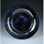 Yalos Casa, a large Murano iridescent glass charger, of circular form with dished centre, stencil