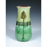 C. H. Brannam for Liberty & Co., an Art Nouveau vase, the tapering cylindrical form with scalloped