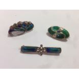 Murrle Bennett & Co., (1896-1914), two Art Nouveau German metalwares and enamel brooches, together