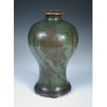 Paul Haustein for WMF, a patinated copper vase, circa. 1927, of inverted baluster form decorated