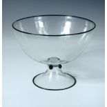 A Venini glass footed bowl, the circular form with black rim to a spreading circular foot, four