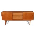 Nils Jonnson for Hugo Troeds, a mid 20th century teak sideboard, with sliding doors to either side