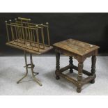 An 18th century style oak joint stool, together with a Victorian brass paper rack