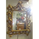 A gilt Florentine wall mirror