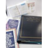 Four stamp albums of Royal commemorative stamps together with another album of stamps and a quantity