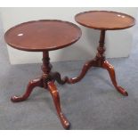 A pair of reproduction mahogany tripod tables, 53cm high x 43cm diameter